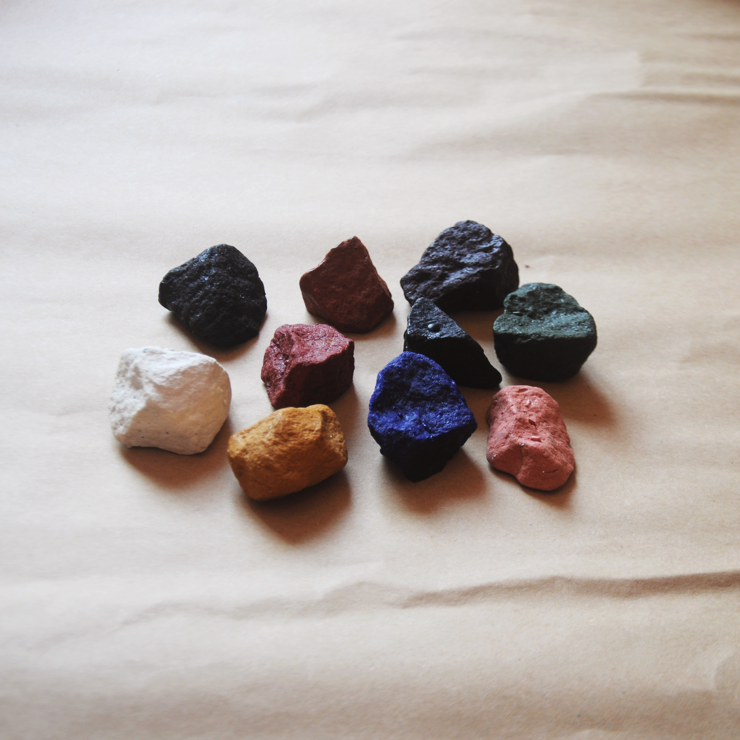 beeswax ocean crayon rocks for kids out of the box on a flat surface