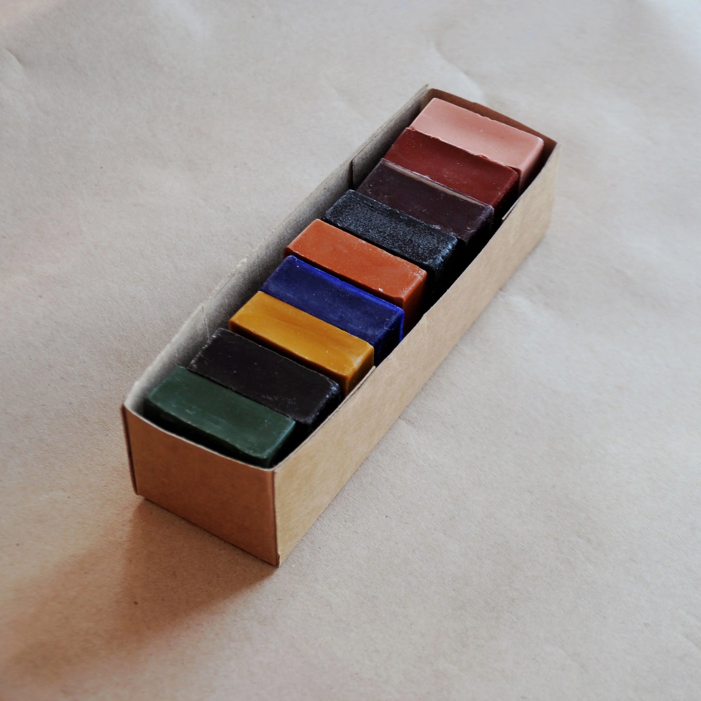 Beeswax block rubbing crayons in a box